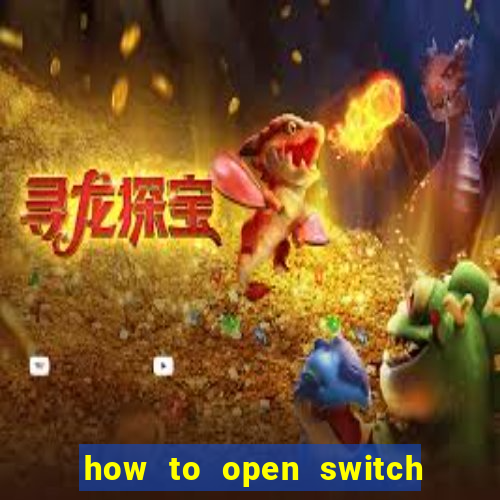 how to open switch oled game card slot